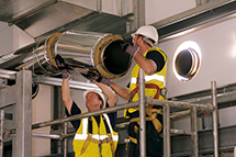 Men assemble chimney