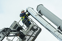 Man installing chimney