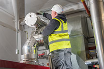 Man installing chimney